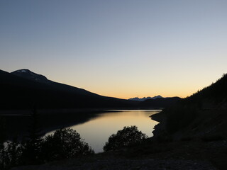 the sunset at the Medicine Lake, Jasper National Park, Icefields Parkway, Rocky Mountains, Alberta, Canada, July
