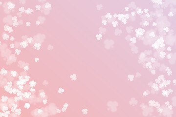 Pale pink bokeh glitter background on club symbol pattern.