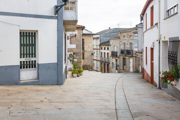 a street with typical houses in Sarria town, province of Lugo, Galicia, Spain