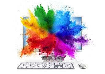 Fototapeta na wymiar modern black silver pc monitor with mouse and keyboard colorful rainbow holi powder cloud explosion through screen isolated white background. computer multimedia abstract art streaming concept.