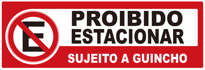A sign that says in Portuguese language : parking is prohibited TOW AWAY. NO PARKING. 
proibido estacionar