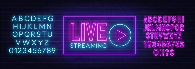 Live streaming neon sign on a brick wall background . Pink and blue neon alphabets.