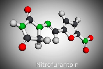 Nitrofurantoin molecule. It is nitrofuran antibiotic used to treat urinary tract infections. Molecular model. 3D rendering