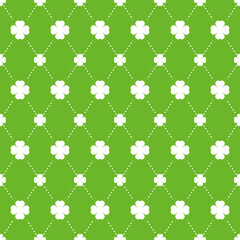 Green four clover leaf seamless pattern vector illustration. Shamrock with argyle dots on green background.