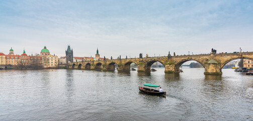 Prague, Czech Republic-February 02, 2019. View of the famous historical Charles bridge over the Vltava river and old town buildings in Prague 1.