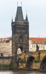 Prague, Czech Republic-February 02, 2019. Clouse up view of the Old Town Bridge Tower one of two bridge towers of the famous historical Charles bridge over the Vltava river in old Prague town.
