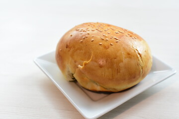 Freshly baked bakery displayed on white wooden background