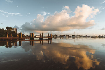 sunset over the lake white black pier horizon sky clouds beautiful place fishing