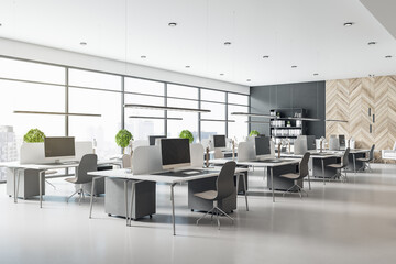 Eco style interior design in modern open space office with grey tables and chairs, wooden decor wall and concrete floor