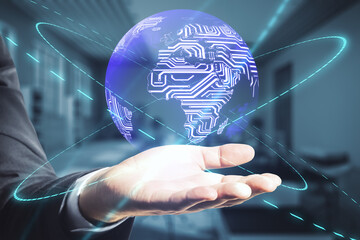 Global network connection concept with digital earth planet, microcircuit world map and glowing rings above businessman hand