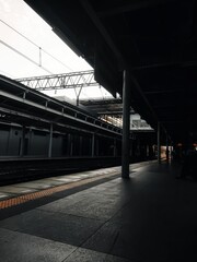 The train station in Jakarta, Indonesian, I'm waiting for the train to come so I can travel, not many people, because covid 19 is still hanging around.