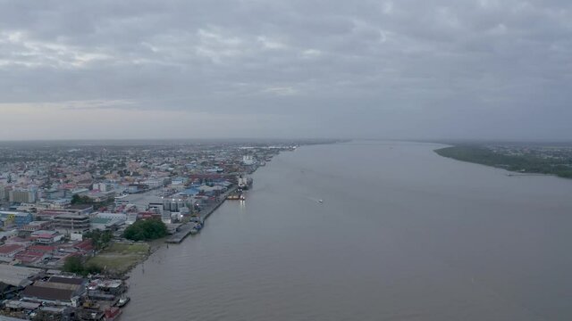 Early morning view of industry around Demarara river in Guyana, Georgetown 