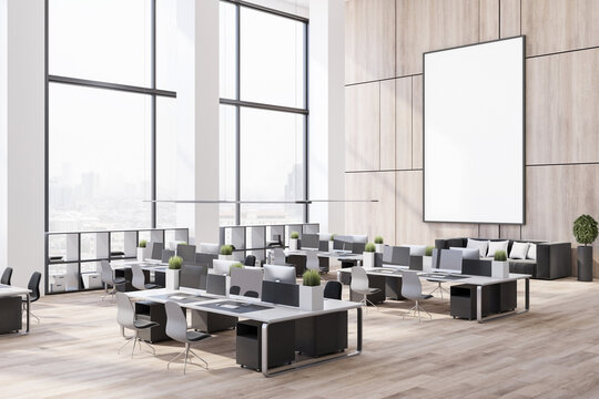 Blank white big poster in black frame on wooden wall in modern office with high ceiling and eco style interior. Mock up