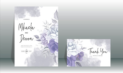 Elegant wedding invitation card with beautiful purple flowers