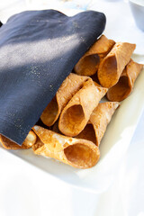 Italian Cuisine - Ingredients and preparation of the original, famous and delicious Sicilian cannoli.