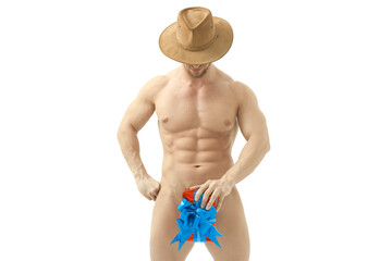 Naked cowboy with sexy ripped sporty body holding present copyspace on side cropped studio shot