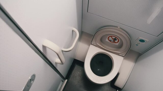 Public Toilet in the Airplane, Airplane Bathroom. Inside a Toilet Onboard Plane