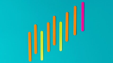 Colored sticks in the form of a graph of profit against the background of the color of sea water.