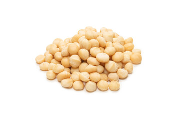 Macadamia nuts isolated on white background.