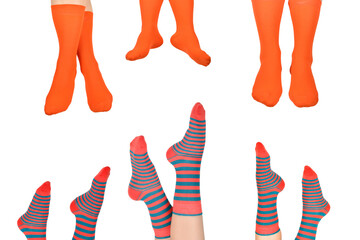 Orange socks on woman foot isolated on white background.