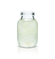 Aloe vera gel in glass jar isolated on white background with clipping path.