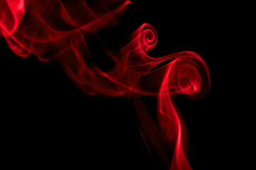 swirling movement of red smoke group, abstract line Isolated on black background