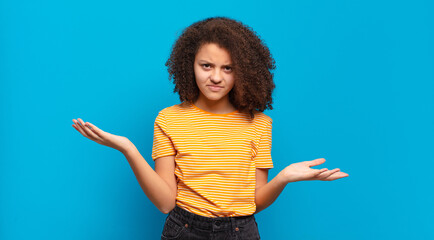  looking puzzled, confused and stressed, wondering between different options, feeling uncertain