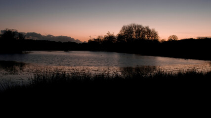 pink sunset in the lake at Richmond Park London