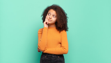  with a concentrated look, wondering with a doubtful expression, looking up and to the side