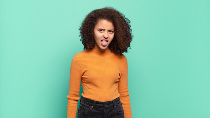  feeling disgusted and irritated, sticking tongue out, disliking something nasty and yucky
