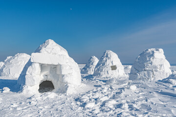 Winter dwelling of Eskimos. Igloo. Eskimos village.