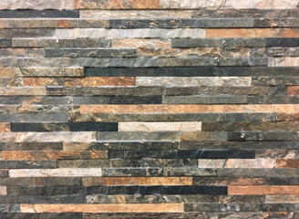 Colourful stone tiles for home improvements to a kitchen splash back or bathroom wall. Interior design full frame background.