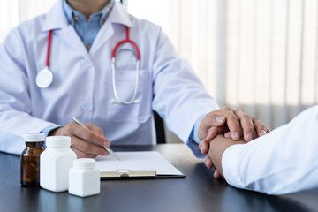 The doctor or pharmacist is discussing and encouraging the results of the treatment. With the patients who were examined, counseling ideas and treatment guidelines