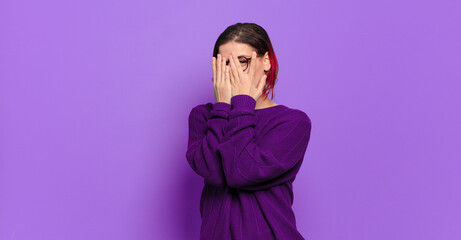  feeling scared or embarrassed, peeking or spying with eyes half-covered with hands