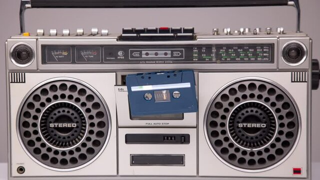 Cassette tape coming out of stereo hifi