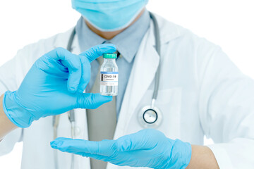 vaccines fight against virus covid-19 corona virus, doctor or scientist in laboratory holding a syringe with liquid vaccines.
