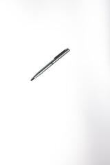 pen isolated on blank white paper with negative space 