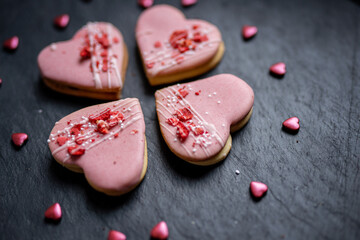 pink heart shaped short bread scotch butter cookies bisquits cakes for wedding, valentines, mothers day love dessert with freeye dried strawberries 