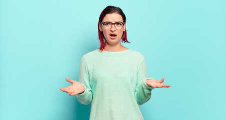  feeling extremely shocked and surprised, anxious and panicking, with a stressed and horrified look