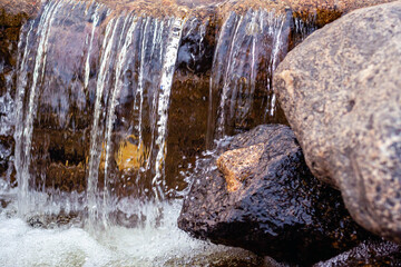 water flowing from a waterfall