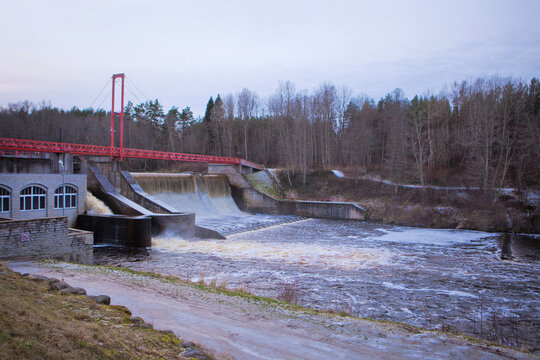 Hydroelectric power station water level at the early winter. Green Energy of moving water. Linnamae hydroelectric power station in Estonia.
