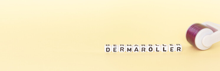 White roller with mesotherapy handle and the inscription 