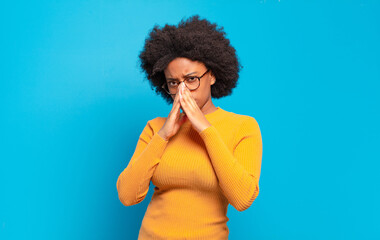  feeling worried, hopeful and religious, praying faithfully with palms pressed, begging forgiveness