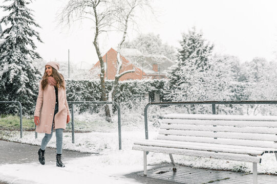 Woman Walking In Winter City