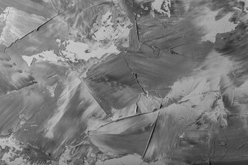 Textured plastered background with a variety of arbitrary stains