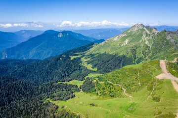 Naklejka premium Summer landscapes of the Caucasus mountains in Rosa Khutor, Russia, Sochi, Krasnaya Polyana. Peak 2320m