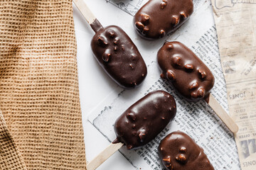 chocolate ice cream on newspaper