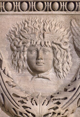 Fototapeta na wymiar Ancient bas-relief of Medusa Gorgon head on marble sarcophagus from Tripoli, Roman period