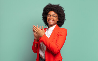  feeling happy and successful, smiling and clapping hands, saying congratulations with an applause