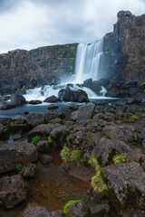 Öxarárfoss is a beautiful waterfall located in western Iceland inside the Þingvellir (Thingvellier) national park.